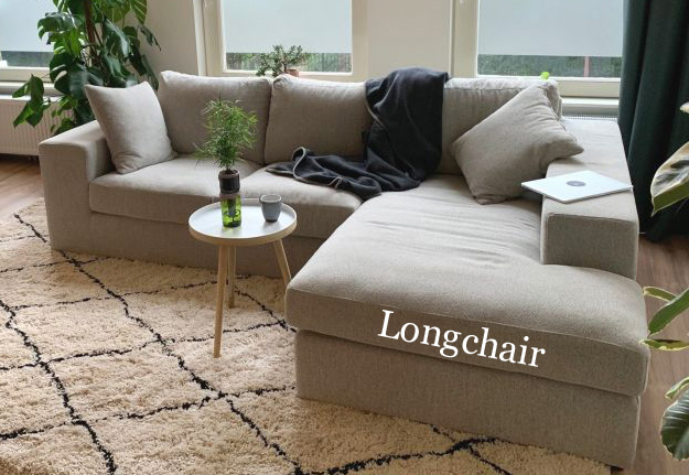 Longchair bank in een grijze stof